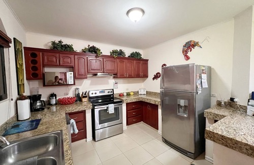 Cerro Plano House | Jaco Hideaway: 1 minute walk to direct beach access.nGated community with pool.