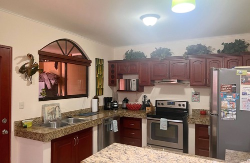 Cerro Plano House | Jaco Hideaway: 1 minute walk to direct beach access.nGated community with pool.