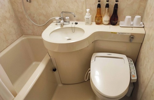 Iwanuma Hotel | Japanesestyle room with 8 tatami mats and a bath /Iwanuma Miyagi