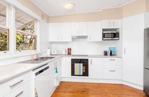 Shoal Bay Cottage | Jen's Place. a charming vintage cottage that embodies the essence of classic coastal living.