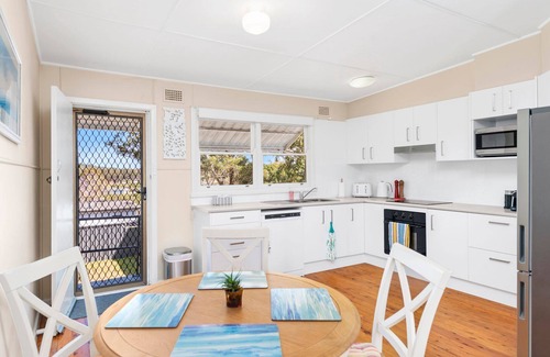 Shoal Bay Cottage | Jen's Place. a charming vintage cottage that embodies the essence of classic coastal living.
