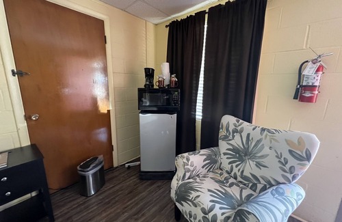Mount Ida Apartment | JI4, King Guest Room at the Joplin Inn at entrance to the resort by RedAwning