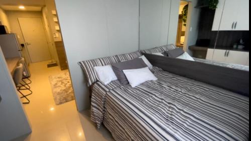Barangay 76 Apartment | Joie's Condotel Shore 2 Residences Tower 1