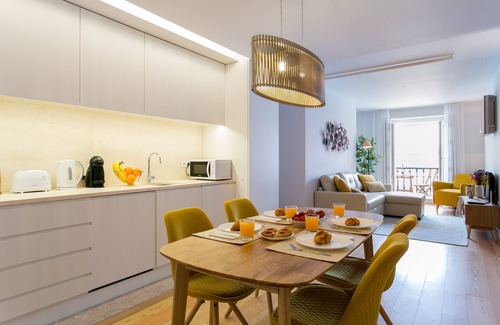 Chiado Apartment | JOIVY Sunny 1-bed flat w/terrace&sea view in Baixa, 3mins to Arco da Rua Augusta