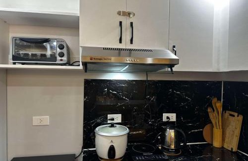 Rosario Apartment | JoyStaycation Condo Hotel