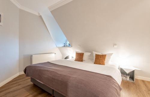 Archsum Apartment | Juliane - Galeriesuite