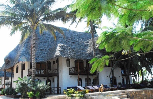 Pwani Mchangani Apartment | Junior Suite 6 Sea Front in a Boutique Hotel with private beach... dreamy