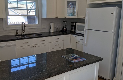 Narragansett Pier Cottage | Just reduced! Great location! Feet from the seawall, walk to Narr. town beach.
