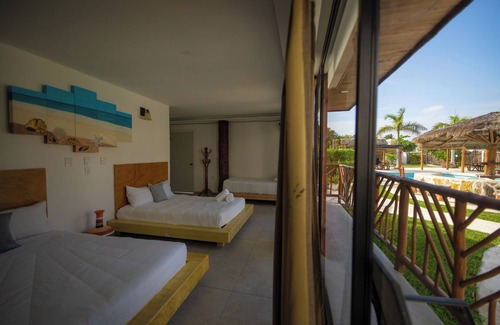 Puerto Morelos Hotel | Kabañas & Beach Club Ojo de Agua