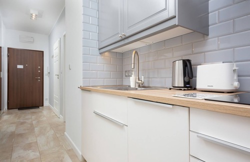 Zoliborz Apartment | Kaliny Jędrusik Apartment by Renters