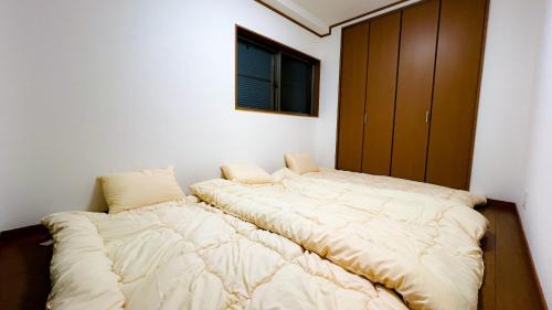 Minato Apartment | kanau 駅から2分 USJ空庭難波梅田まで10分!まるごと一軒家貸し切り!大人数宿泊可能!駐車場有