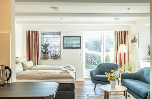 Harrislee Apartment | Kapitänshaus Niehuus fewo1846 - Webleinstek - moderne Wohnung mit Terrasse auf parkähnlichem Grundstück