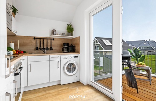 Busum Apartment | Karlsson Büsum: fireplace, infrared cabin, close to the beach and the North Sea, balcony