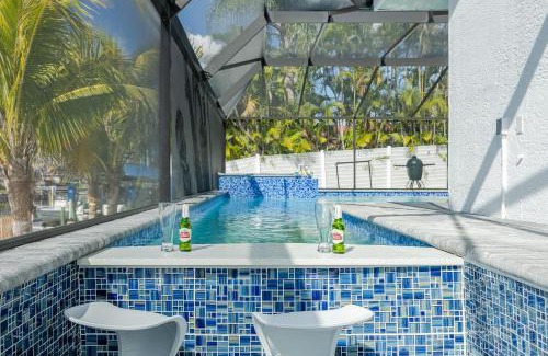 Cape Coral House | Kayaks, Boat Dock, Heated Pool & Spa, Outside Kitchen, Tiki Hut - Villa Pedro - Roelens Vacations