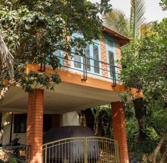 Bengaluru House | Kerala Style Villa by JadeCapsAC4BHKFishpond