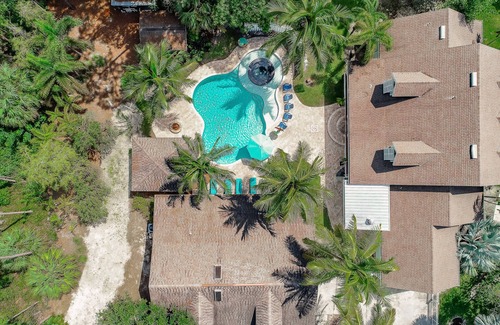 Oakes Estates House | Key West Style Luxury Home with resort style heated pool and infinity line spa