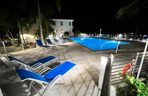 Rock Harbor House | Keys Escape 4 Stories, Rooftop Views & 3 Suites