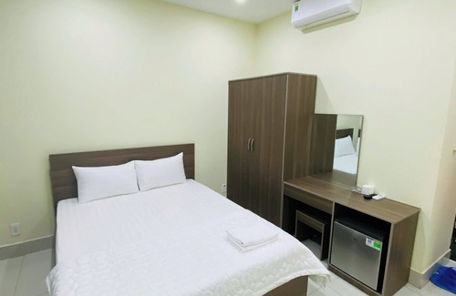 District 5 Hotel | Khach San Gia Thanh
