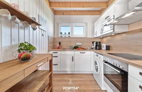 Olpenitz House | Kick in - infrared sauna, fireplace, bathtub, terrace, beach chair, parking lot
