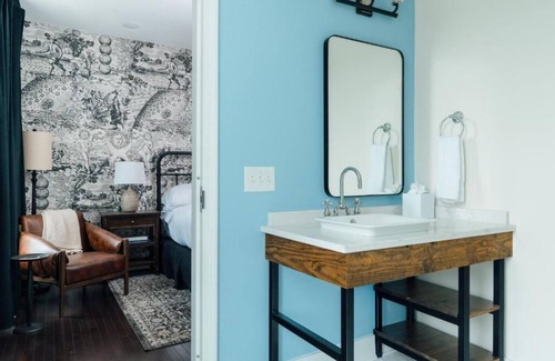 Five Points South Hotel | King Room at The Painted Lady! Pet-Friendly, Free Parking! Near Regions Field!