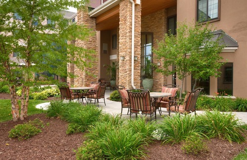 Omaha Condo | King Suite. Free Breakfast. Pool. Gym. Great for Business Travelers!