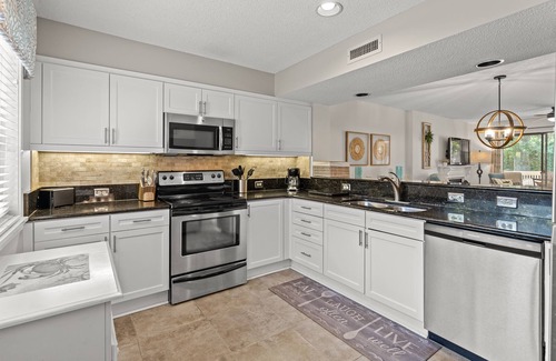 Arcadian Shores Villa | Kingston WHP 2B Ground level Villa w/pool/beach