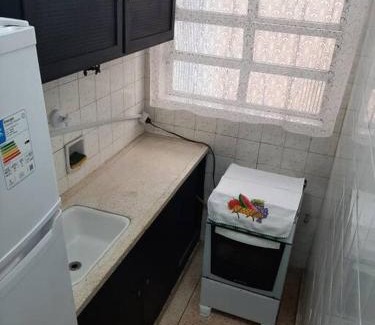 Boqueirao Apartment | kitnet pé na areia, em frente a praia.