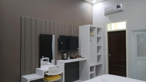 Palangkaraya Hotel | Kiwi Guest House Palangka Raya