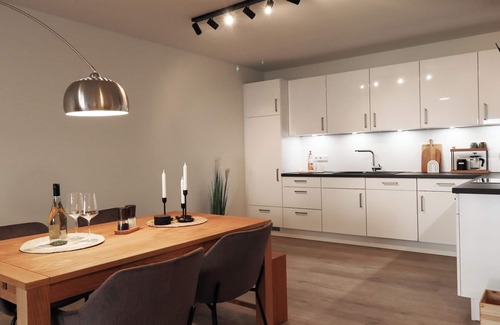 Tossens Apartment | Kojoten33 - pure North Sea feeling. Balcony. Stylish. Close to the beach.