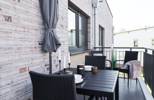Tossens Apartment | Kojoten33 - pure North Sea feeling. Balcony. Stylish. Close to the beach.