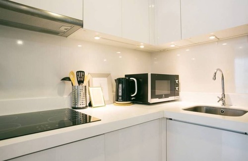 Embassy District Apartment | KOTI 944 Condolette Light Convent
