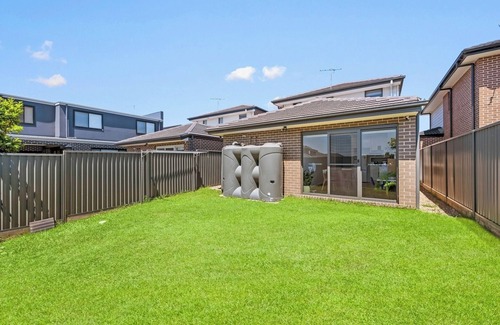 Austral House | KozyGuru | Austral | Charming 4Bedroom Family Home