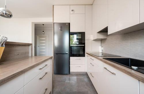 Zoliborz Apartment | Krasińskiego Deluxe Apartment by BookingHost
