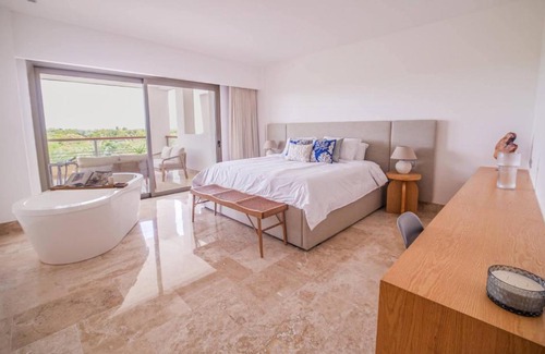 Playa Mujeres Apartment | La Amada Residences Private Beach Getaway with Pools & Gym