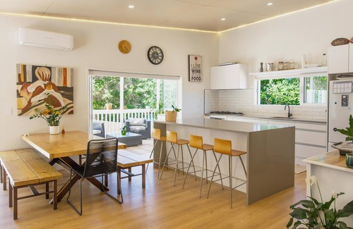 Ostend Villa | La Maison Soleil - Modern, sun-filled home with 4 bedrooms (2 kings including a stand-alone sleepout in the pool area, 2 queens) and 3 tiled bathrooms. Features a full kitchen, aircon, and open living flowing to a large garden with BBQ, heated swim s