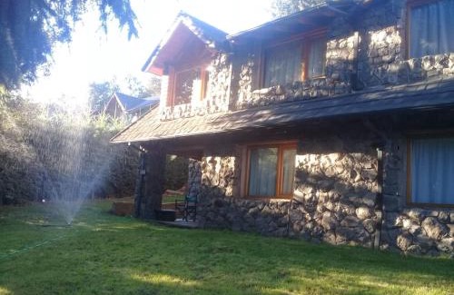La Villa Ski Chalet | LA Nevadita, Chalet cabin located near the center- It includes suite room with double bed and another 2 bedrooms with two singles beds- Living room fireplace, Hot water, WI-FI