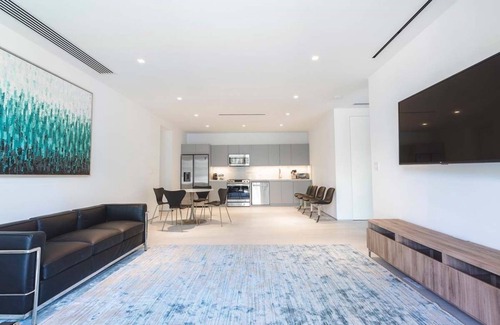 Dunmore Town House | La Palmeraie Modern House, Oceanfront, private beach, rooftop deck, maid & more!
