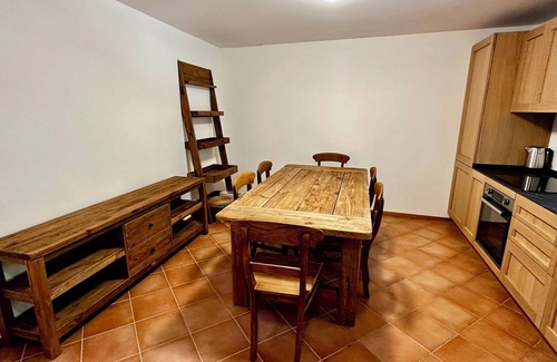 Laives Apartment | La Torre - Appartamento quadrilocale al piano attico in stile rustico