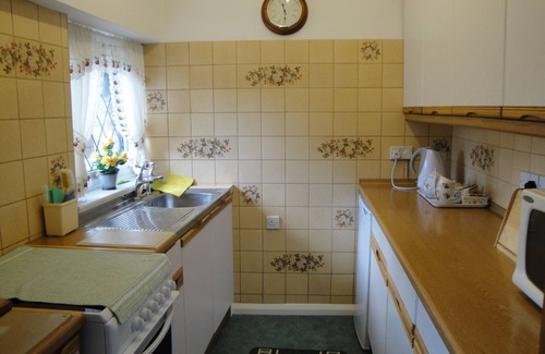 Greystoke Cottage | Lake District oak-beamed cottage.Pet welcome. Summer heated outdoor pool.