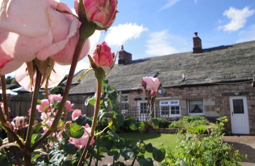 Greystoke Cottage | Lake District oak-beamed cottage.Pet welcome. Summer heated outdoor pool.