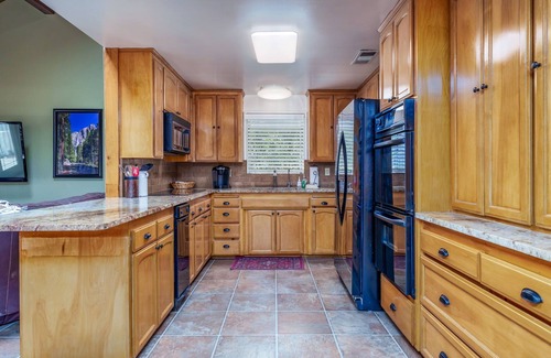 Bass Lake House | Lake Front Home with Dock Gameroom & Boat rental option-