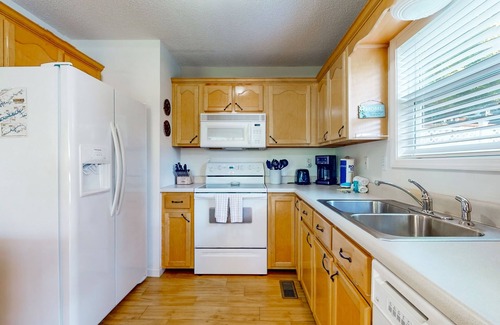 Big Creek House | Lake front home with games, fire pit, gas grill and dock