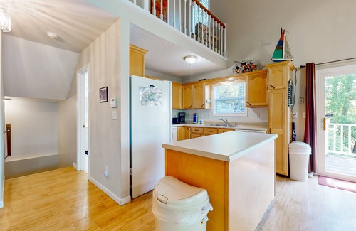 Big Creek House | Lake front home with games, fire pit, gas grill and dock