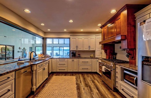 Hiawassee House | Lake Haven on Chatuge - By Chatuge Home Concierge Indoor Pool, covered boat slip, swim dock, hot tub, firepit , beach sand volleyball , kayaks