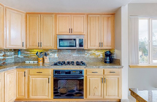 Tahoe Keys House | Lake Tahoe Hideaway with rooftop hot tub, fireplace, scenic balcony, & smart TVs