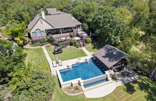 Leander House | Lake Travis Tranquility: waterfront w/pool, hot tub, boat dock, bar & game room