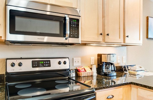 Three Lakes Condo | Lake-view condo with balcony, gas fireplace, indoor pool, hot tubs, & gym