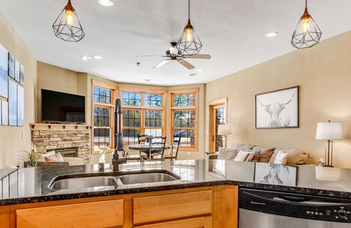 Three Lakes Condo | Lake-view condo with patio, fireplace, hot tubs, pools, firepit, gym, golf & W/D