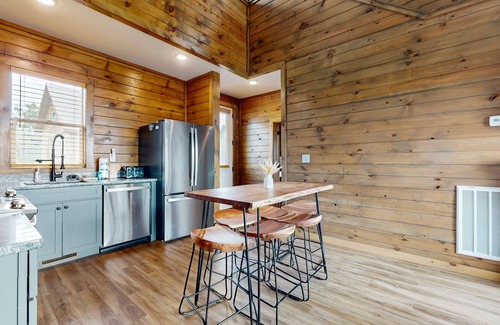 Sevierville Cabin | Lake view home w/hot tub, rocking chairs, fireplace, & free attraction tickets