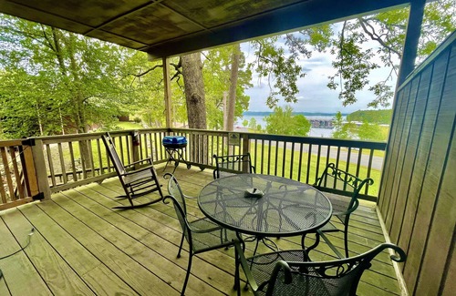 Mount Ida Apartment | Lake view King Studio with full kitchen, deck overlooking Lake Ouachita, king bed and queen sleeper sofa by RedAwning